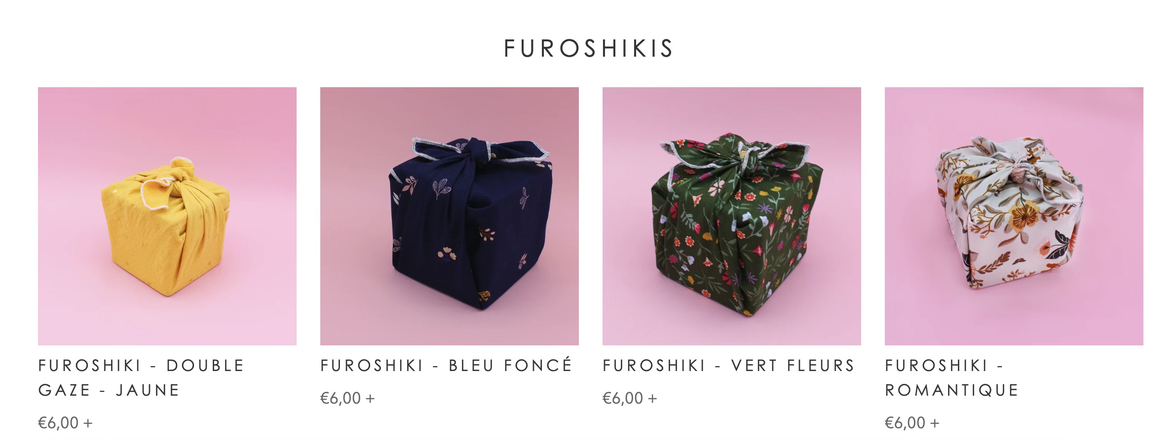 4 Paquets cadeaux emballés dans des tissus différents.